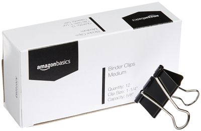 AmazonBasics Medium binder clips: Packaging view. The visible Quantity 12 label does not establish the offered pack count.